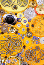 Carica l'immagine nel visualizzatore di Gallery, Close-up detail of precision assembly work on recycled household objects