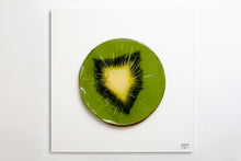 Carica l'immagine nel visualizzatore di Gallery, Kiwi slice front view recycled metal sculpture sustainable art white background