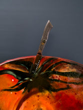 Load image into Gallery viewer, Close-up of the metal knife emerging from Tomatinho recycled traffic sign sculpture by Scoobafish.