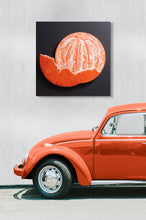 Load image into Gallery viewer, Peeled mandarin sculpture lifestyle photo orange car sustainable art display