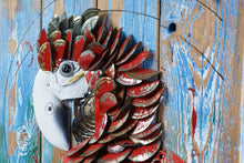 Load image into Gallery viewer, Close-up of Proud Parrot’s head by Scoobafish, showing the white beak, mechanical eye and layered red metal feathers on painted wood.