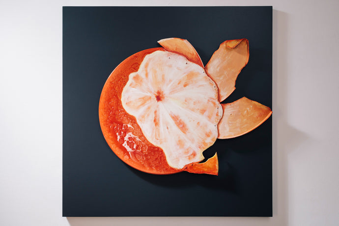 Orange Striptease peeled orange front view recycled metal sculpture sustainable art