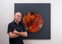 Load image into Gallery viewer, Artist Scoobafish with Tomatinho, an original recycled traffic sign sculpture from the TuttiFrutti Collection.
