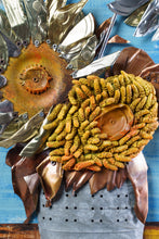 Load image into Gallery viewer, Close-up detail of Sunflowers III by Scoobafish, featuring a golden sculptural sunflower made from recycled metal beside a rusted metal flower and copper-toned leaves.
