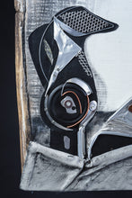 Load image into Gallery viewer, Close-up of the black jug in Black Jug and Skull by Scoobafish, assembled from layered reclaimed metal and plastic components.
