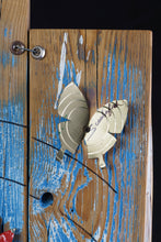 Load image into Gallery viewer, Close-up of two butterflies assembled from reclaimed fragments on the weathered blue-painted wooden background of Proud Parrot by Scoobafish.
